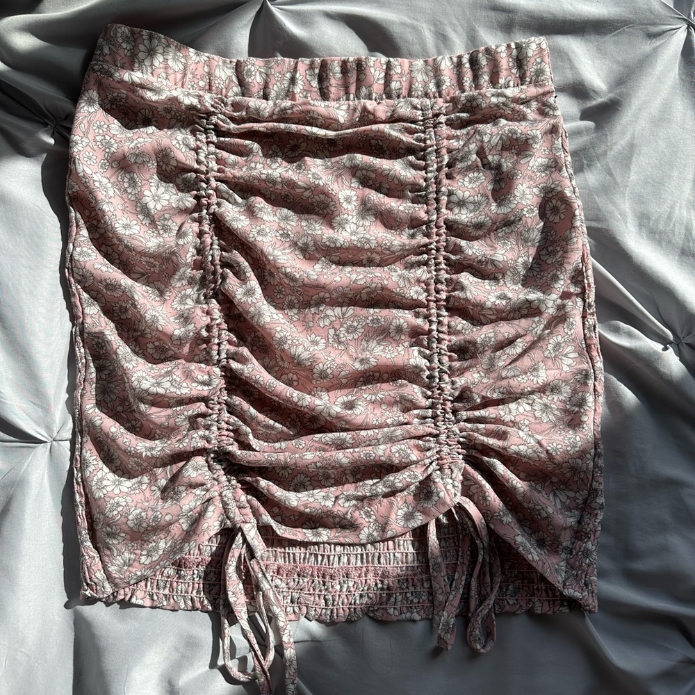 pink skirt with white flowers